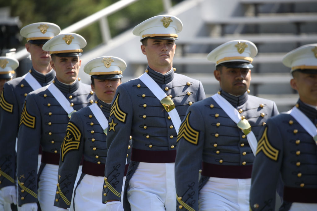 Cadets standing at the US Military Academy graduation ceremony